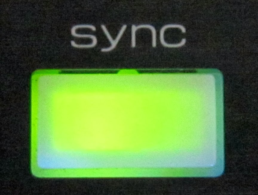 Sync button from a Vestax VCI-100.